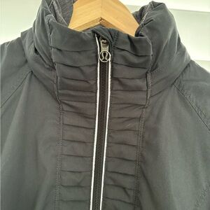 Lululemon full zip fitted jacket with hidden hood. Size 12, black